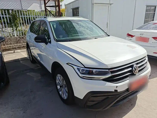 Volkswagen Tiguan L — Фото автомобиля 3
