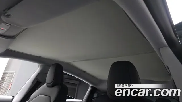 Tesla Model Y — Фото автомобиля 22