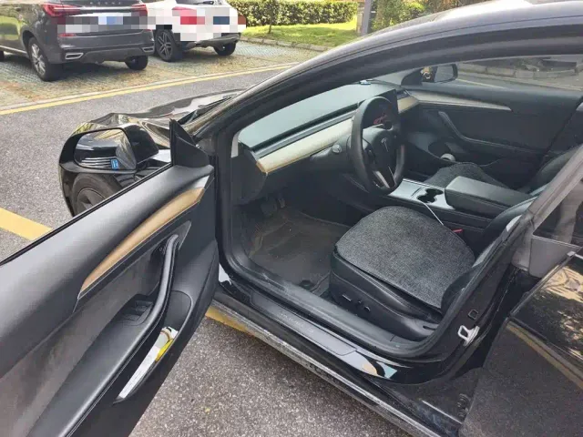 Tesla Model 3 — Фото автомобиля 12