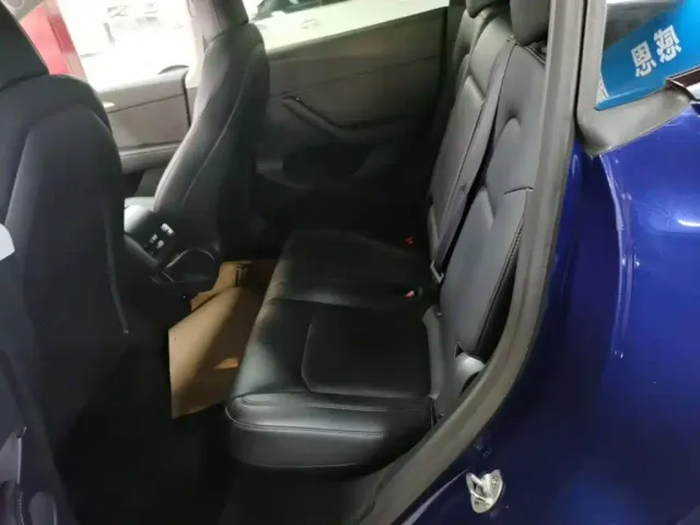 Tesla Model Y — Фото автомобиля 16