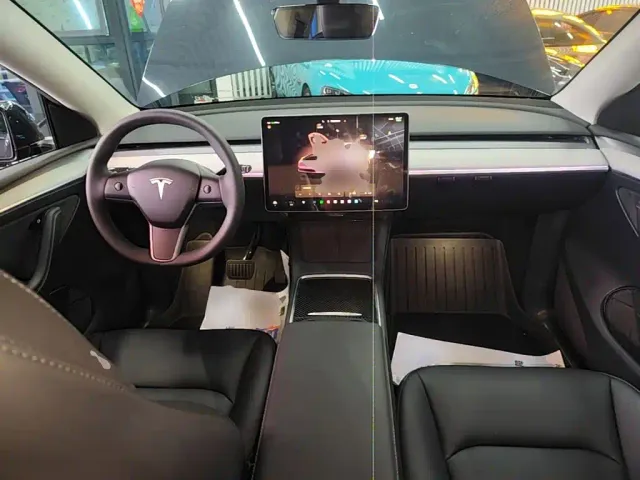 Tesla Model Y — Фото автомобиля 9