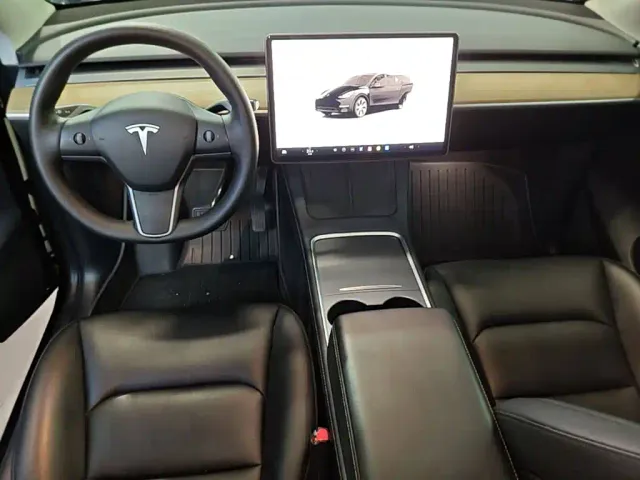 Tesla Model Y — Фото автомобиля 9