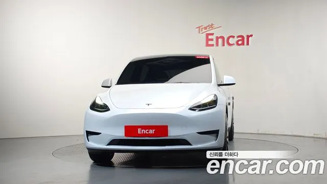 Tesla Model Y — Фото автомобиля 2