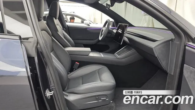 Tesla Model Y — Фото автомобиля 16