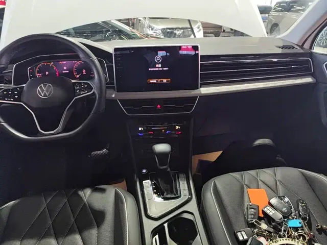 Volkswagen Tiguan L — Фото автомобиля 8