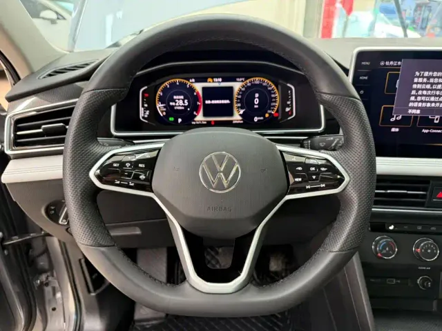 Volkswagen Tiguan L — Фото автомобиля 11