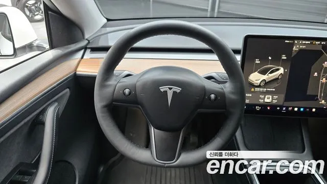 Tesla Model Y — Фото автомобиля 13
