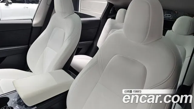 Tesla Model Y — Фото автомобиля 28