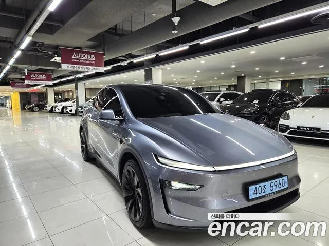 Tesla Model Y — Фото автомобиля 2