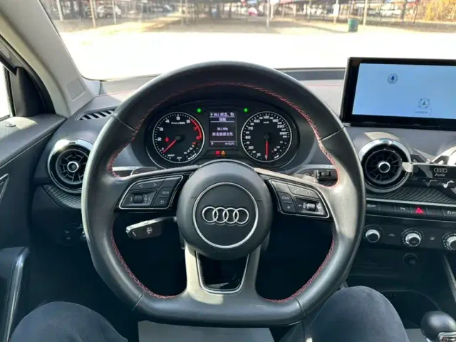 Audi Q2L — Фото автомобиля 12