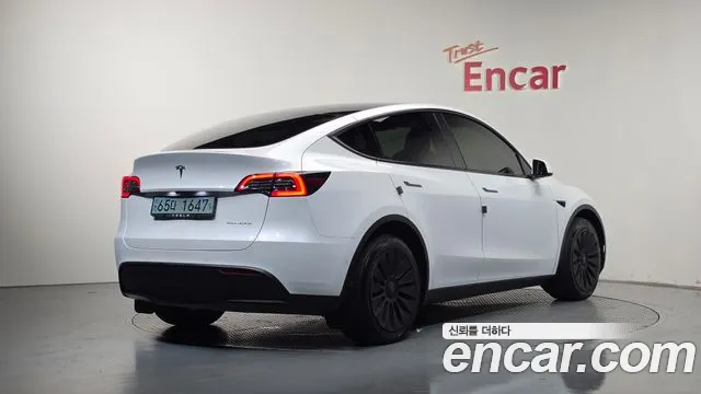 Tesla Model Y — Фото автомобиля 2