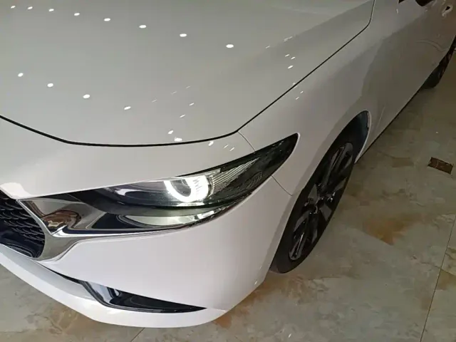Mazda Axela — Фото автомобиля 23