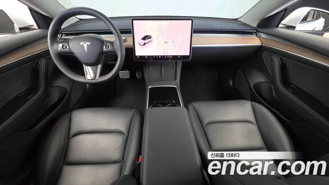 Tesla Model 3 — Фото автомобиля 7