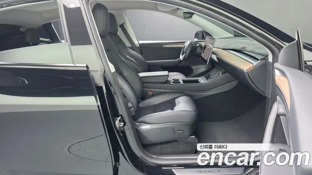 Tesla Model Y — Фото автомобиля 15