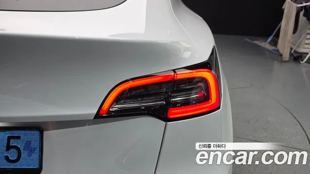 Tesla Model Y — Фото автомобиля 8