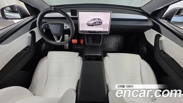 Tesla Model Y — Фото автомобиля 10