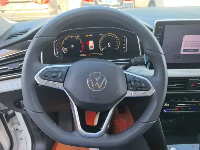 Volkswagen Tiguan L — Фото автомобиля 10
