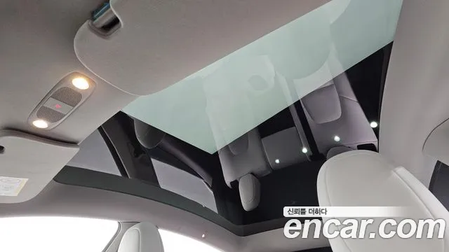 Tesla Model Y — Фото автомобиля 25