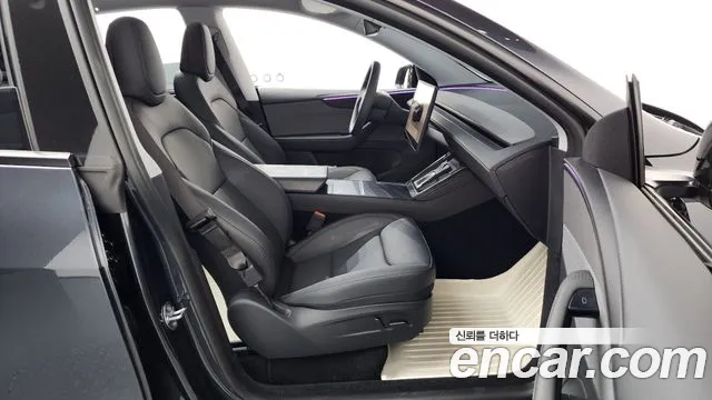Tesla Model Y — Фото автомобиля 11