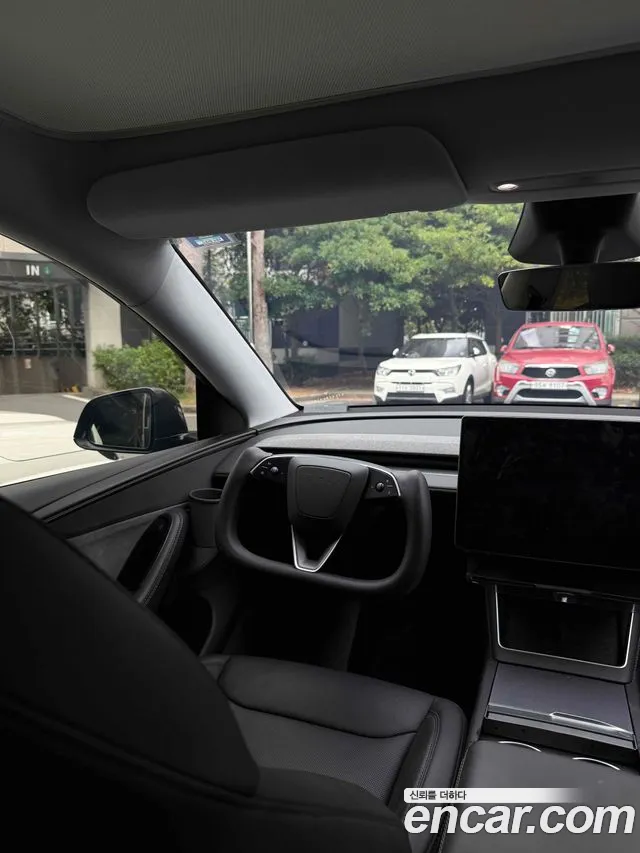 Tesla Model Y — Фото автомобиля 9