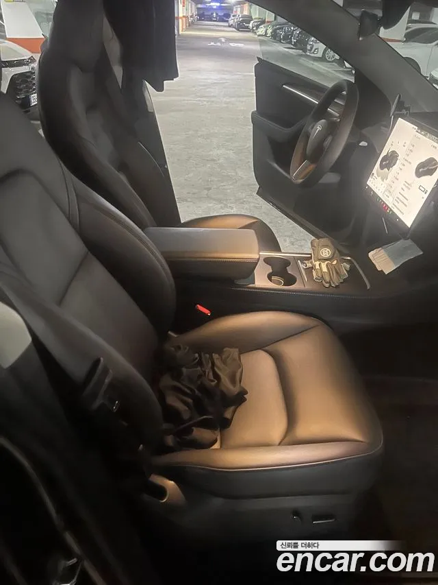 Tesla Model Y — Фото автомобиля 15