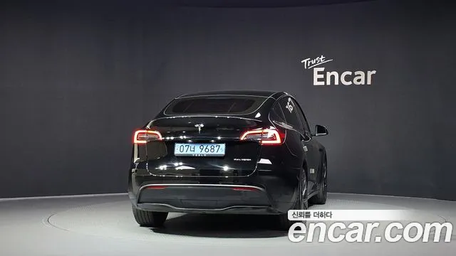 Tesla Model Y — Фото автомобиля 4