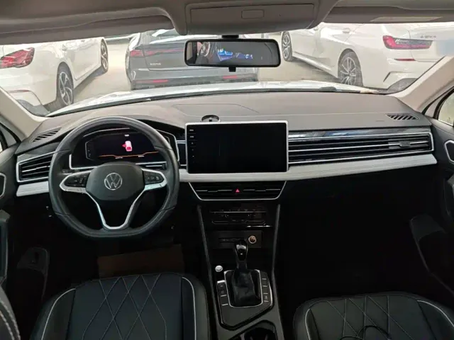 Volkswagen Tiguan L — Фото автомобиля 9