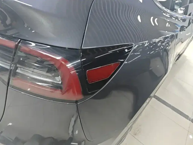 Tesla Model Y — Фото автомобиля 7