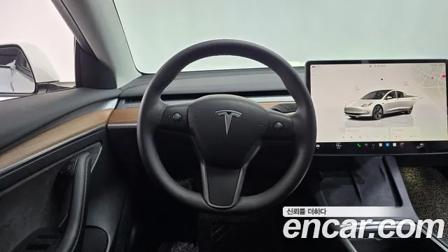 Tesla Model 3 — Фото автомобиля 14
