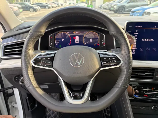Volkswagen Tiguan L — Фото автомобиля 5