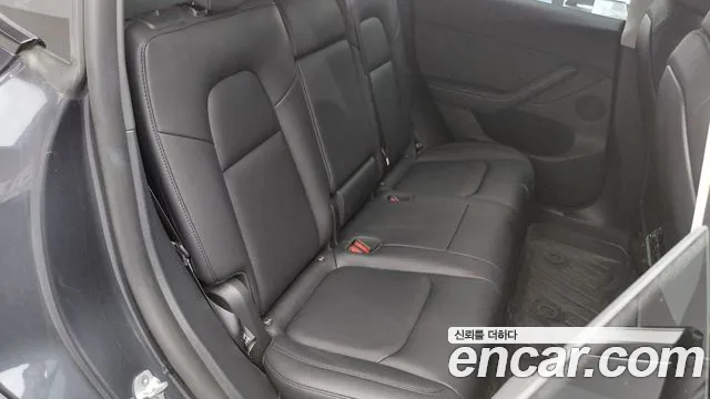 Tesla Model Y — Фото автомобиля 18