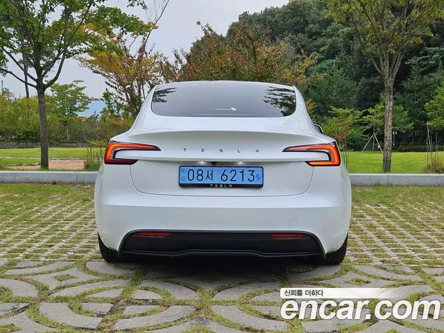 Tesla Model 3 — Фото автомобиля 4