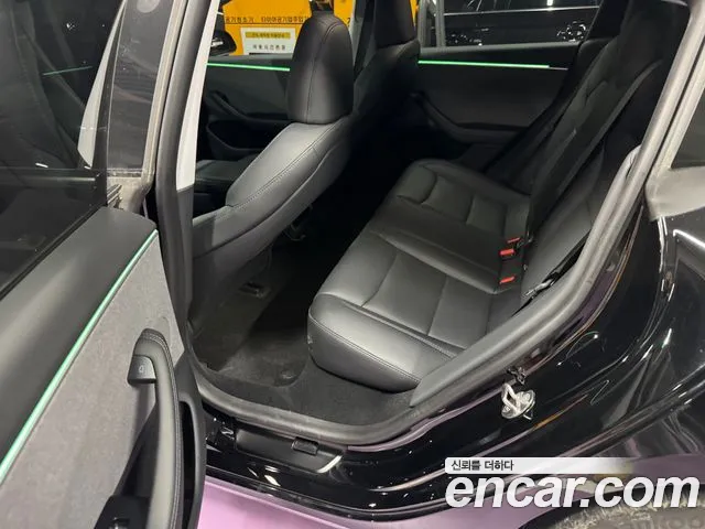 Tesla Model 3 — Фото автомобиля 15