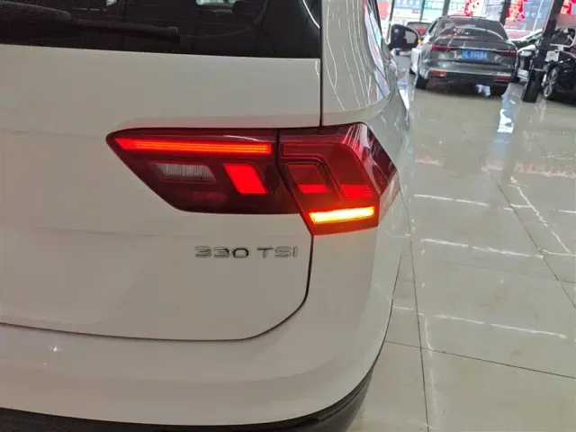 Volkswagen Tiguan L — Фото автомобиля 7