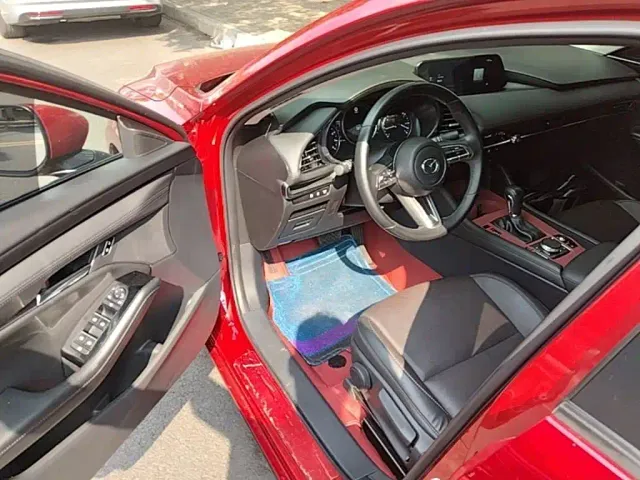 Mazda Axela — Фото автомобиля 15