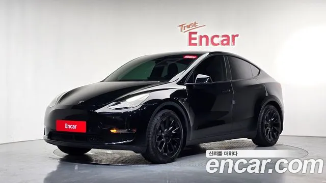 Tesla Model Y — Фото автомобиля 10