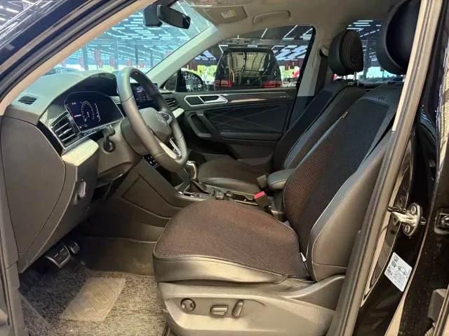 Volkswagen Tiguan L — Фото автомобиля 5