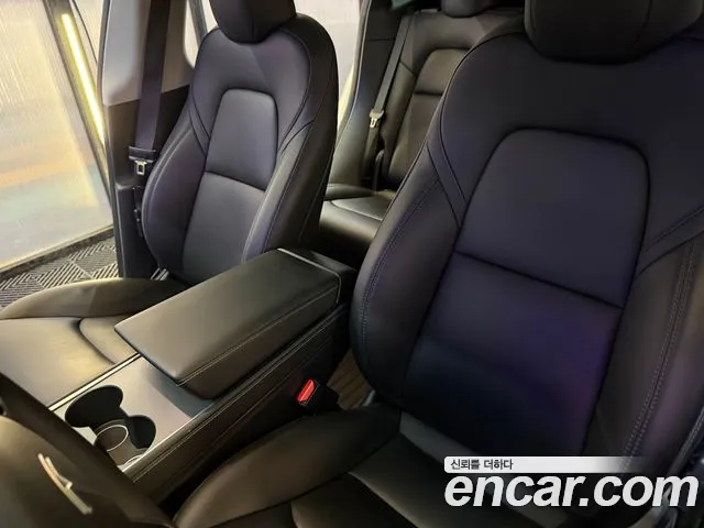 Tesla Model Y — Фото автомобиля 10