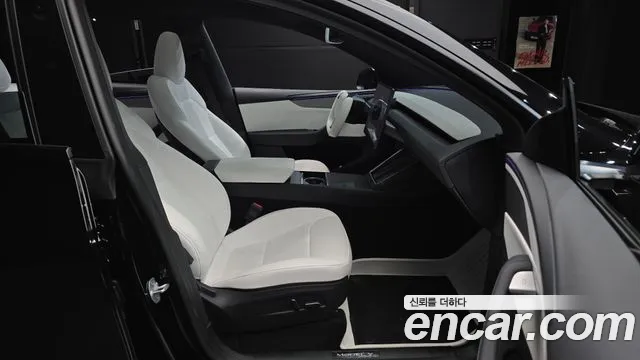 Tesla Model Y — Фото автомобиля 26