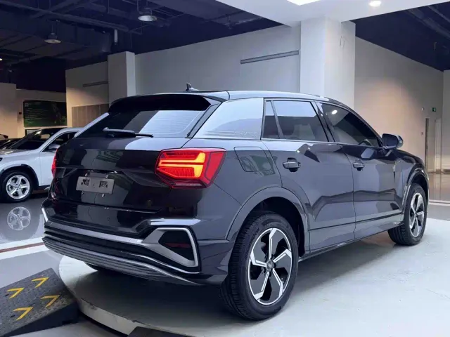 Audi Q2L e-tron — Фото автомобиля 6