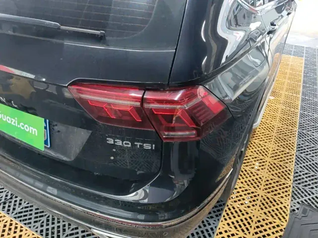 Volkswagen Tiguan L — Фото автомобиля 7