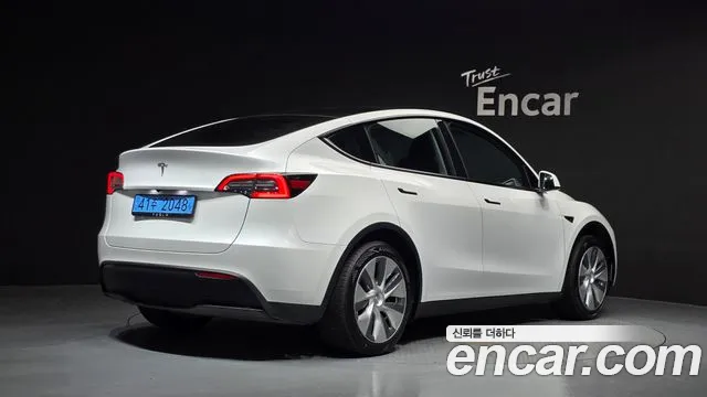 Tesla Model Y — Фото автомобиля 2