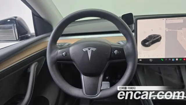 Tesla Model Y — Фото автомобиля 13