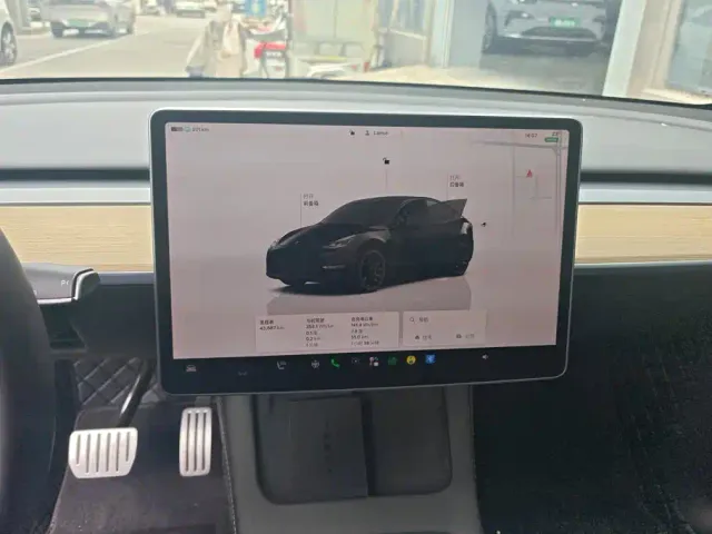 Tesla Model Y — Фото автомобиля 13