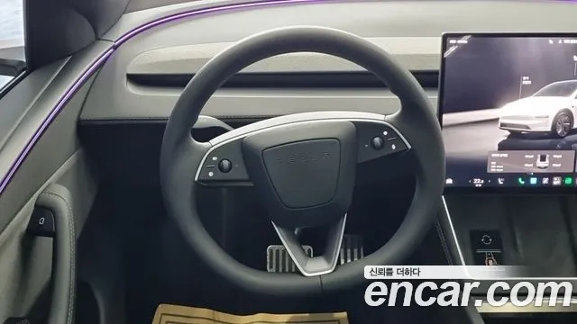 Tesla Model Y — Фото автомобиля 11