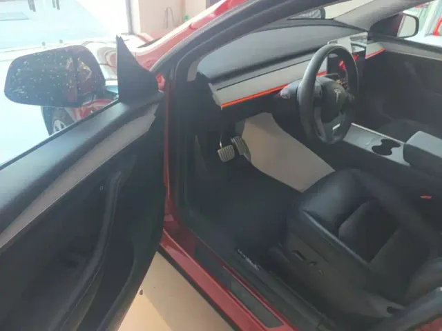 Tesla Model Y — Фото автомобиля 15