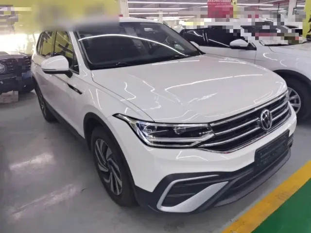 Volkswagen Tiguan L — Фото автомобиля 3