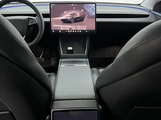 Tesla Model Y — Фото автомобиля 13