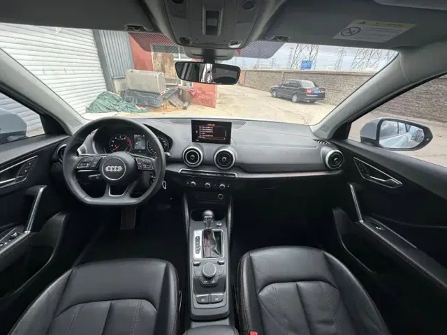 Audi Q2L — Фото автомобиля 10