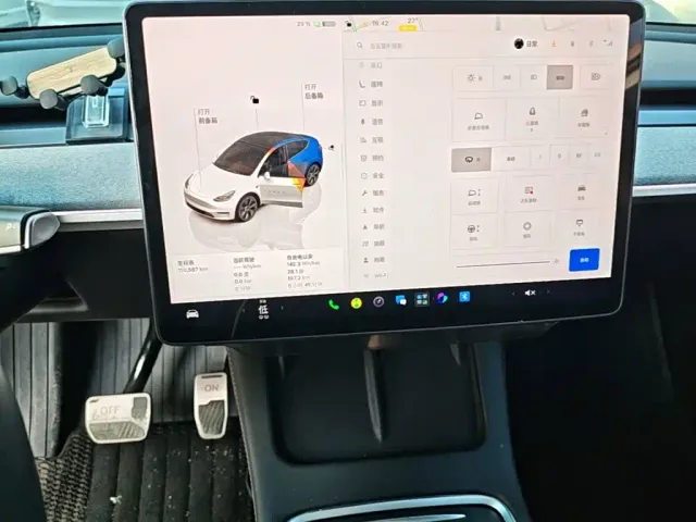 Tesla Model Y — Фото автомобиля 11